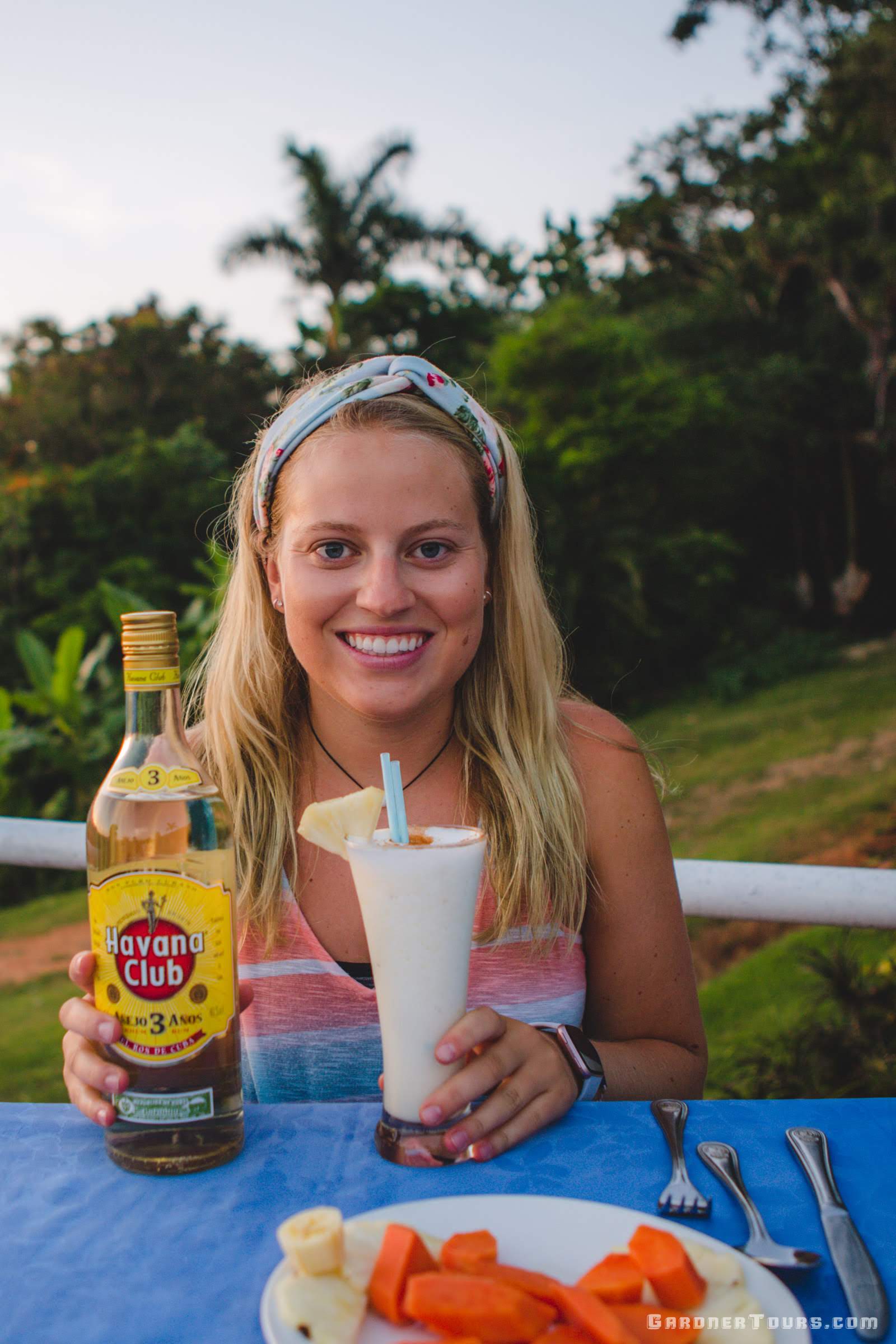 A Gorgeous Girl enjoying a Piña Colada at Sunset in Viñales, Cuba
