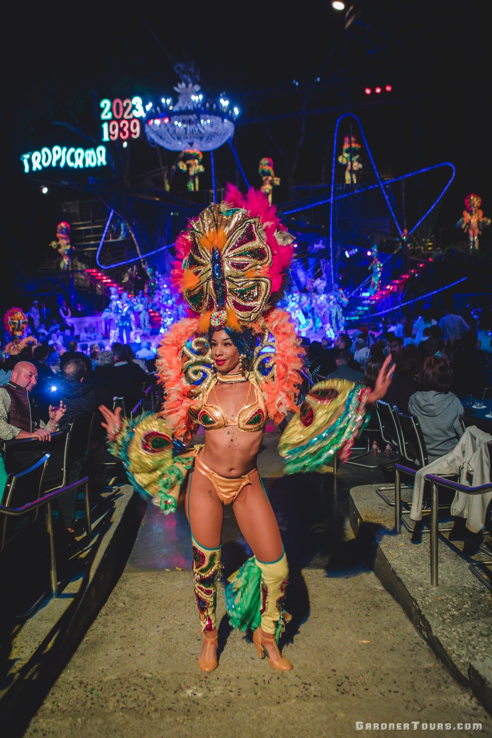 Colorful Woman Dancer with a full Head dress at the Tropicana Cabaret's Big Show in Havana, Cuba