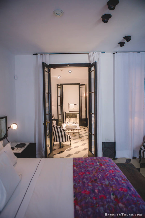 Gardner Tours Old Havana Cuba Casa Particular BnB 5-star Luxury Accommodations Bedroom View looking into the Living Room and Bathroom