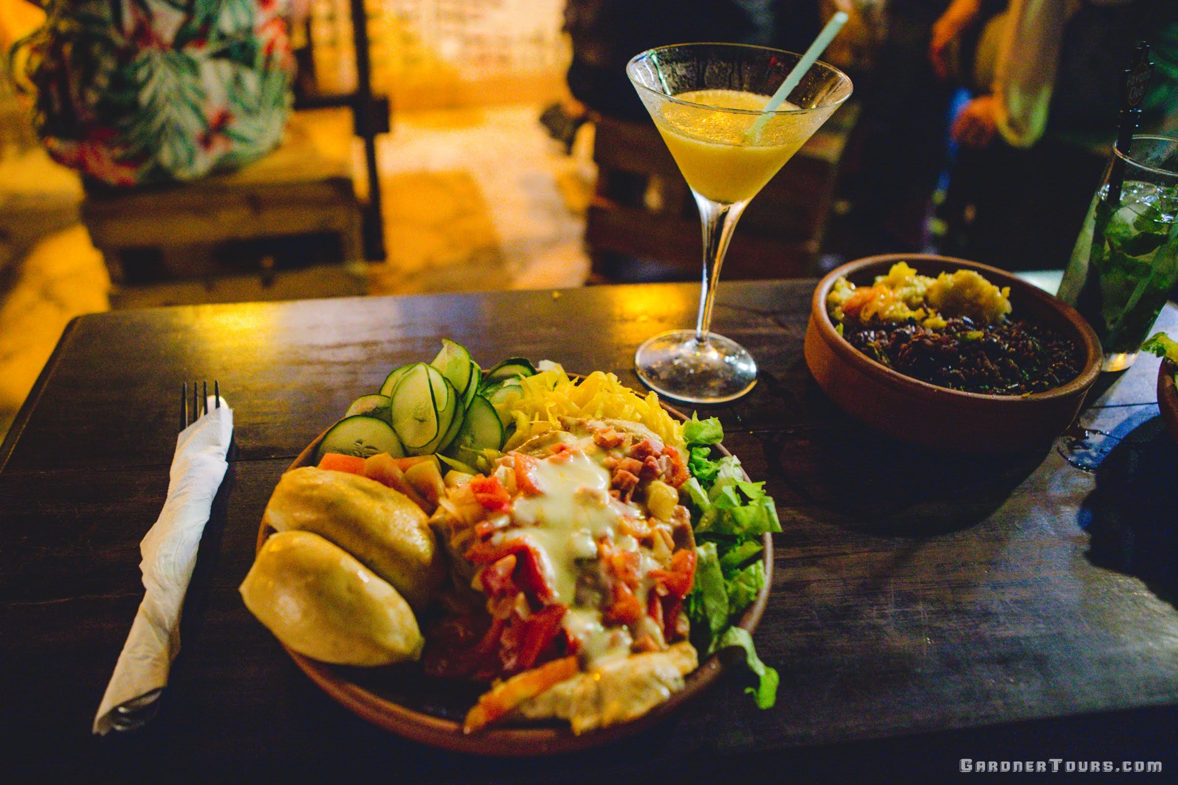 Amazing Dinner Plate with pork, bread, vegetables, rice and Cuban Black Beans and a Mango Daiquiri at Restaurant Paladar El Chancullero in Old Havana, Cuba