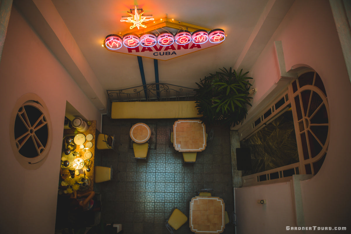 Luxurious Dining Room with Welcome to Fabulous Havana, Cuba Sign at Sunrise or Sunset in 4-Star BnB in Old Havana, Cuba
