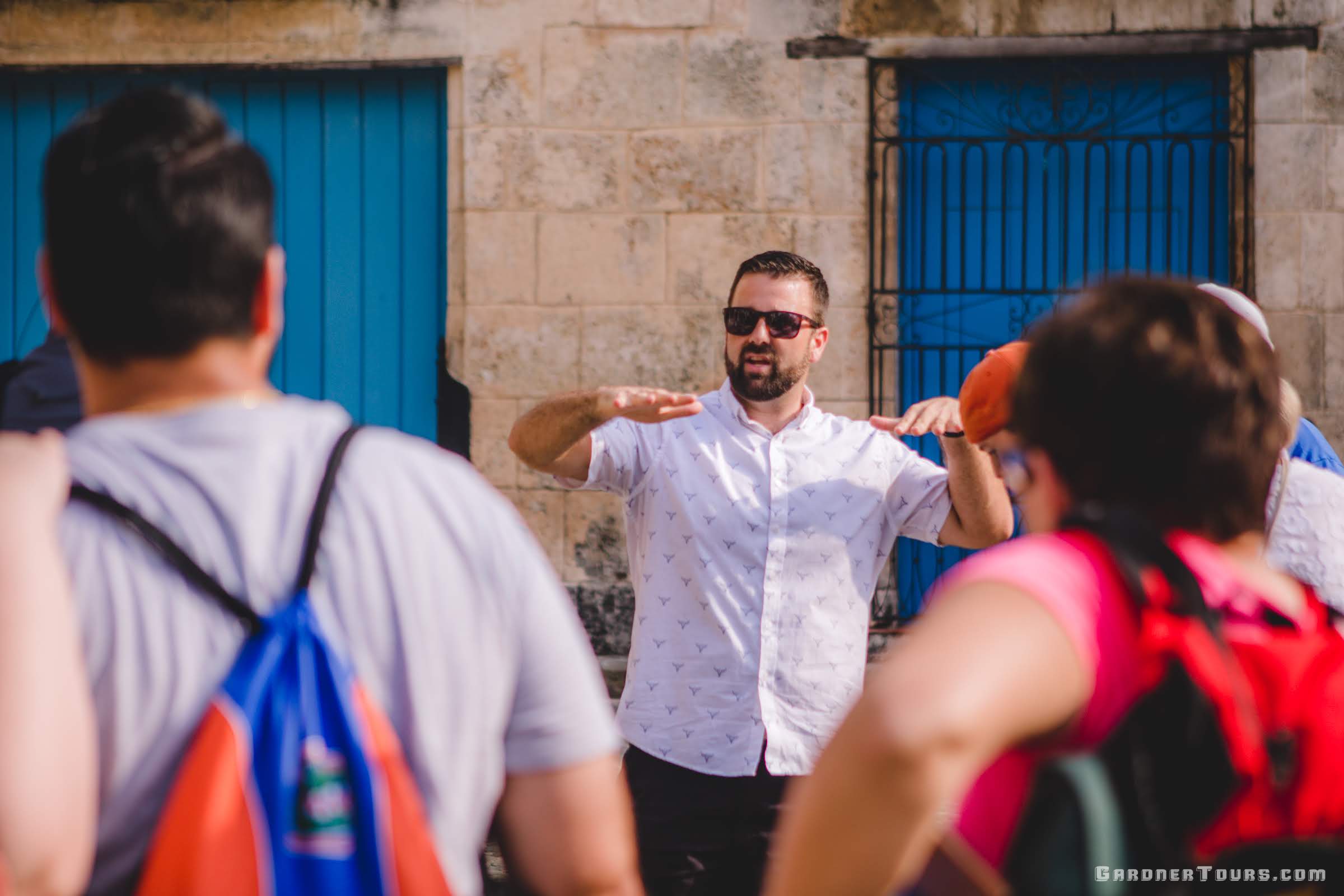 Gardner Tours Owner and Tour Guide Colby Gardner explaining about 18th century architecture in Old Havana, Cuba