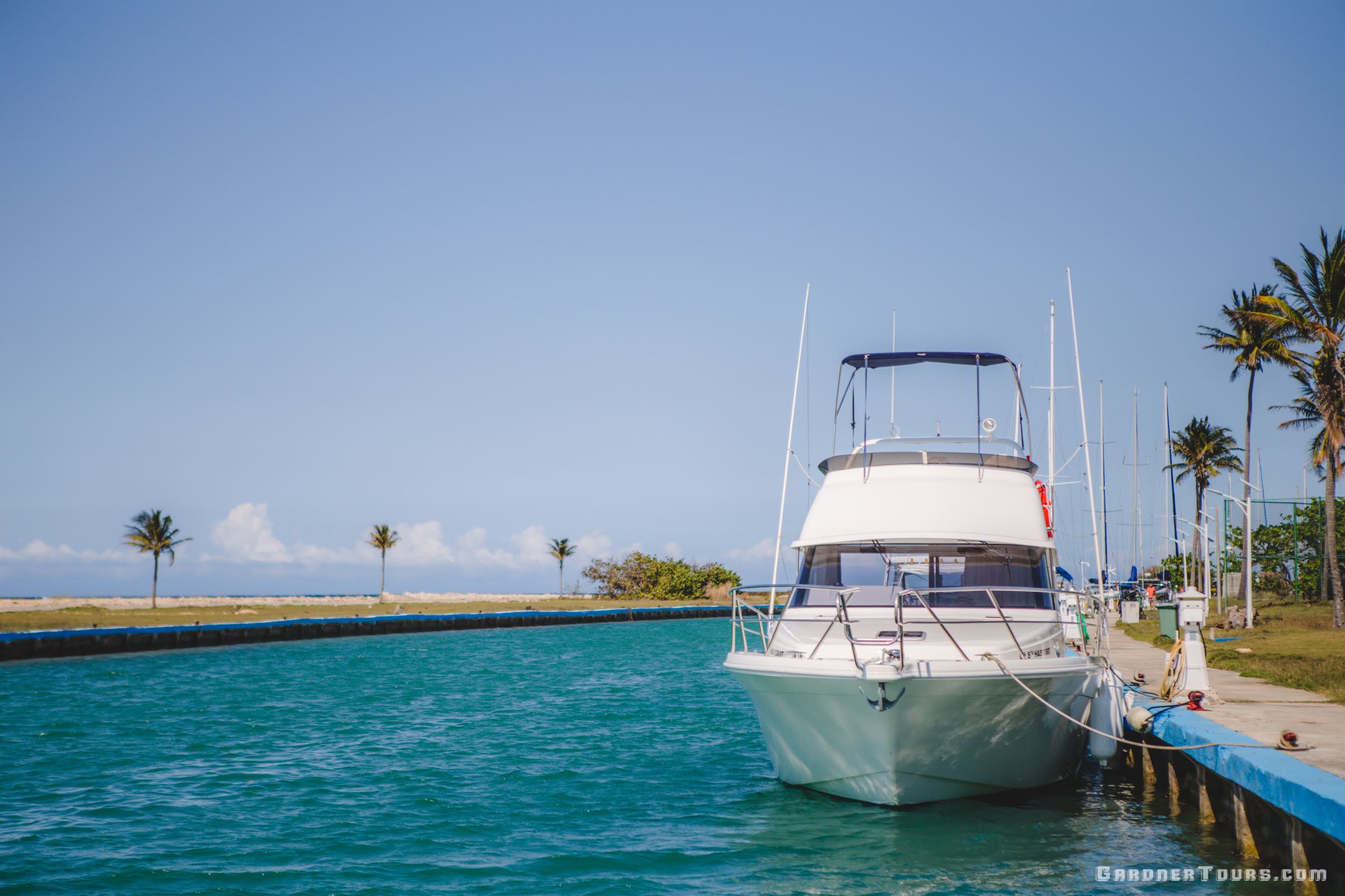 The Pilar Fishing Boat at dock during a calm morning waiting on fishermen to arrive to go offshore fishing in Havana Cuba