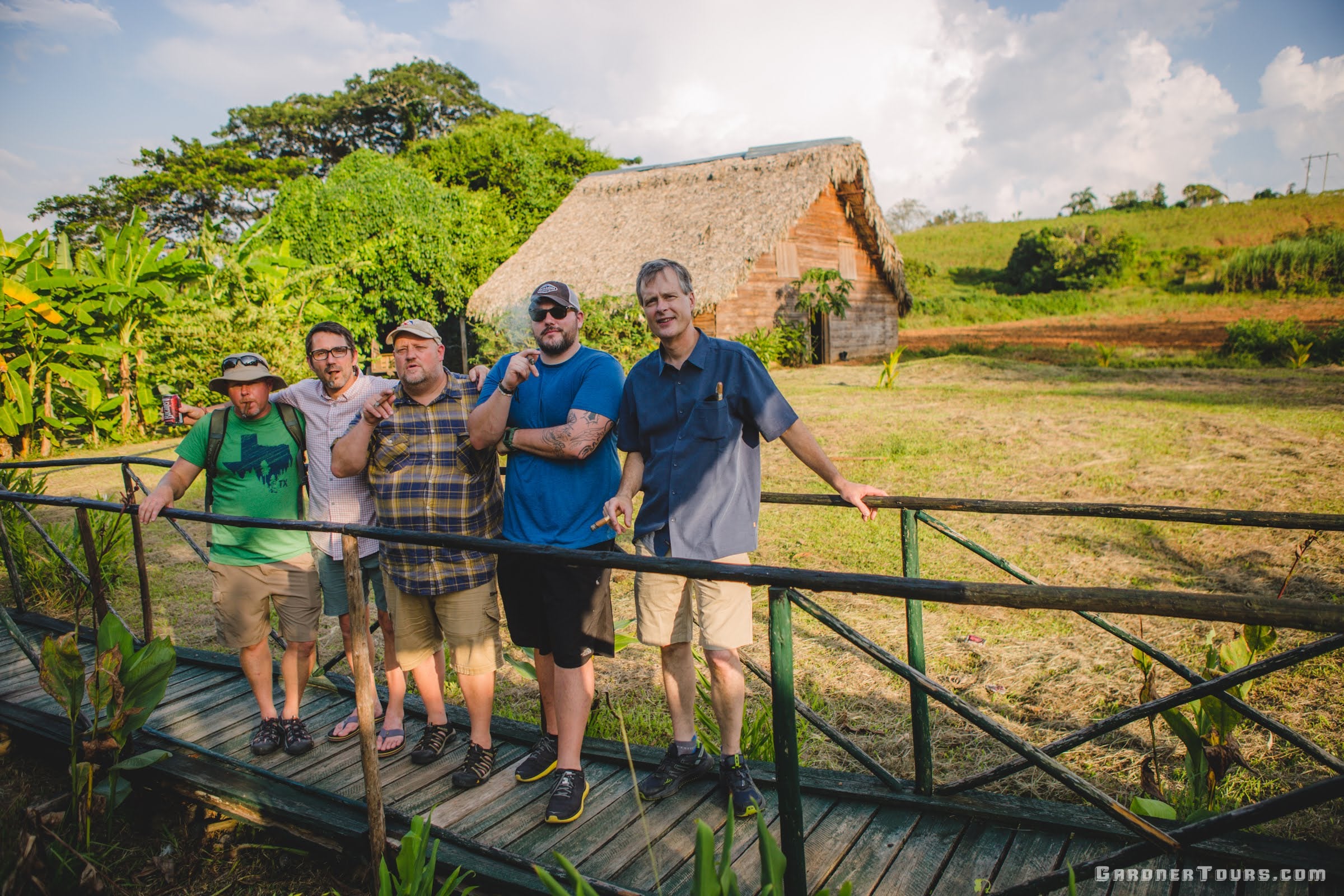 Five Friends Smoking Cigars and Enjoying Cuban Tobacco Farm in Viñales, Cuba