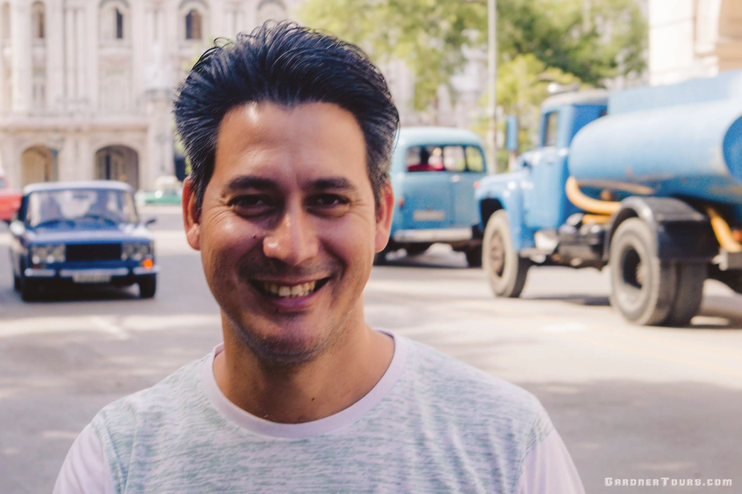 Gardner Tours Cuban Tour Guide Carlos Smiling in the Streets of Old Havana, Cuba