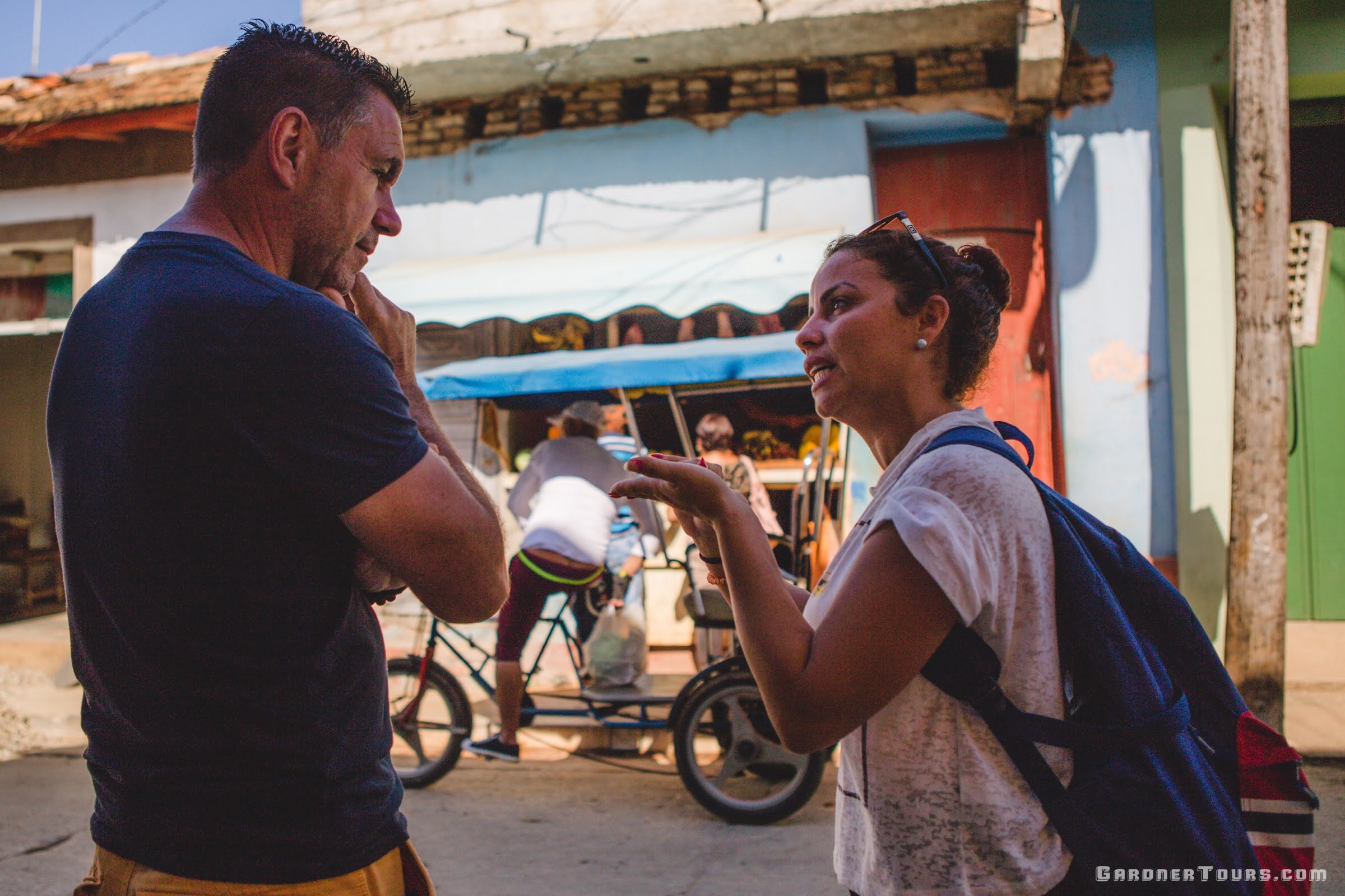 Gardner Tours Cuban Tour Guide Zeydi explaining how Cuban rations work to her Dutch traveler in Trinidad Sancti Spiritus Cuba