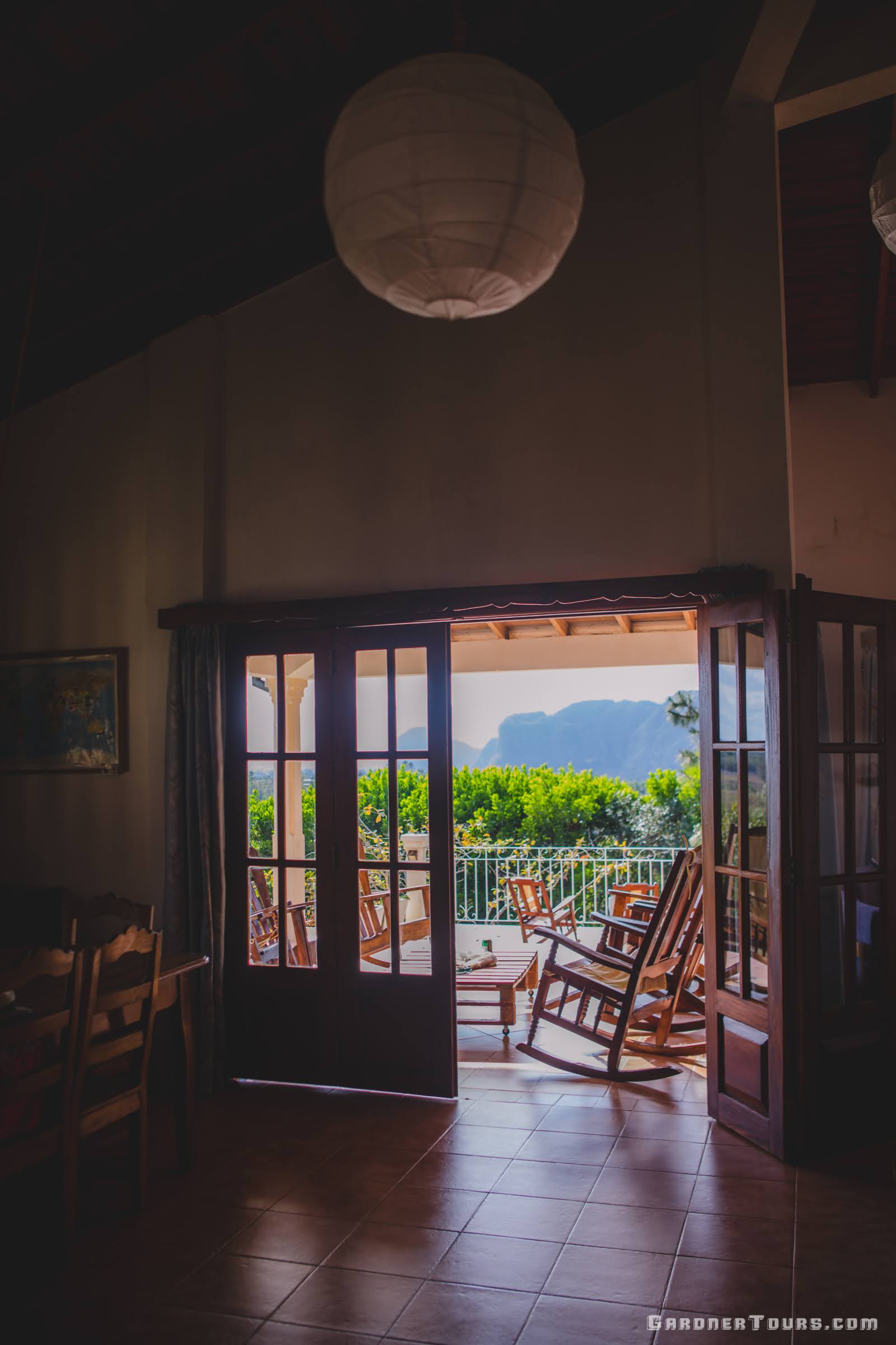 A 4-Star Casa Particular BnB with a beautiful View of the Vinales Valley and the sitting porch with rocking chairs from the living room in Viñales, Cuba