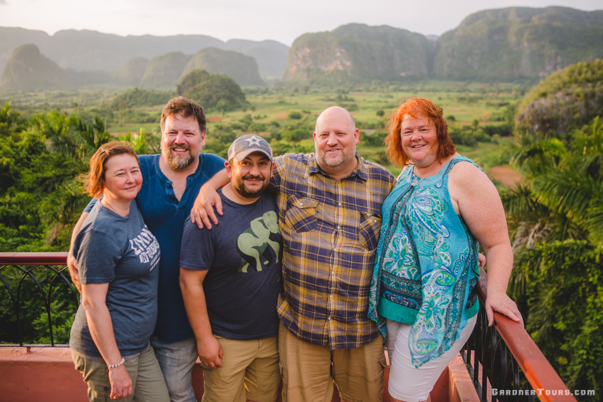 Gardner Tours Vinales Valley Tour Cuba Family Enjoying the Viewpoint of the Viñales Valley at Hotel Los Jazmines