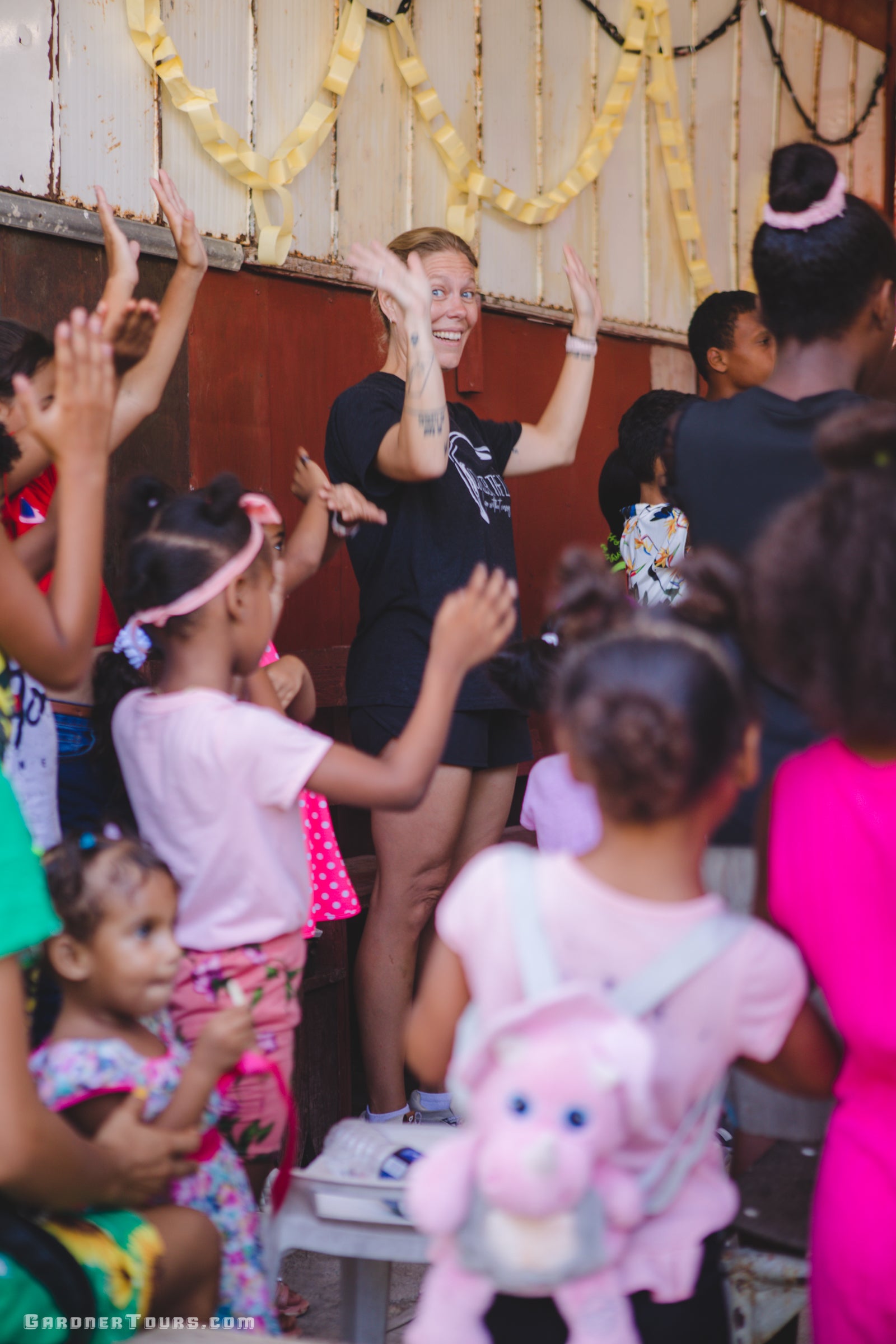 Woman with children in a room with decorative elements
