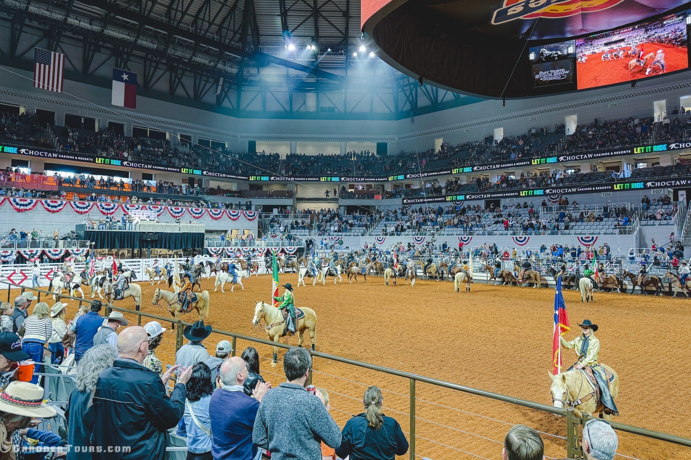 A close-up view of the opening ceremony from the stands at the Fort Worth Stock Show and Rodeo in Fort Worth, Texas.