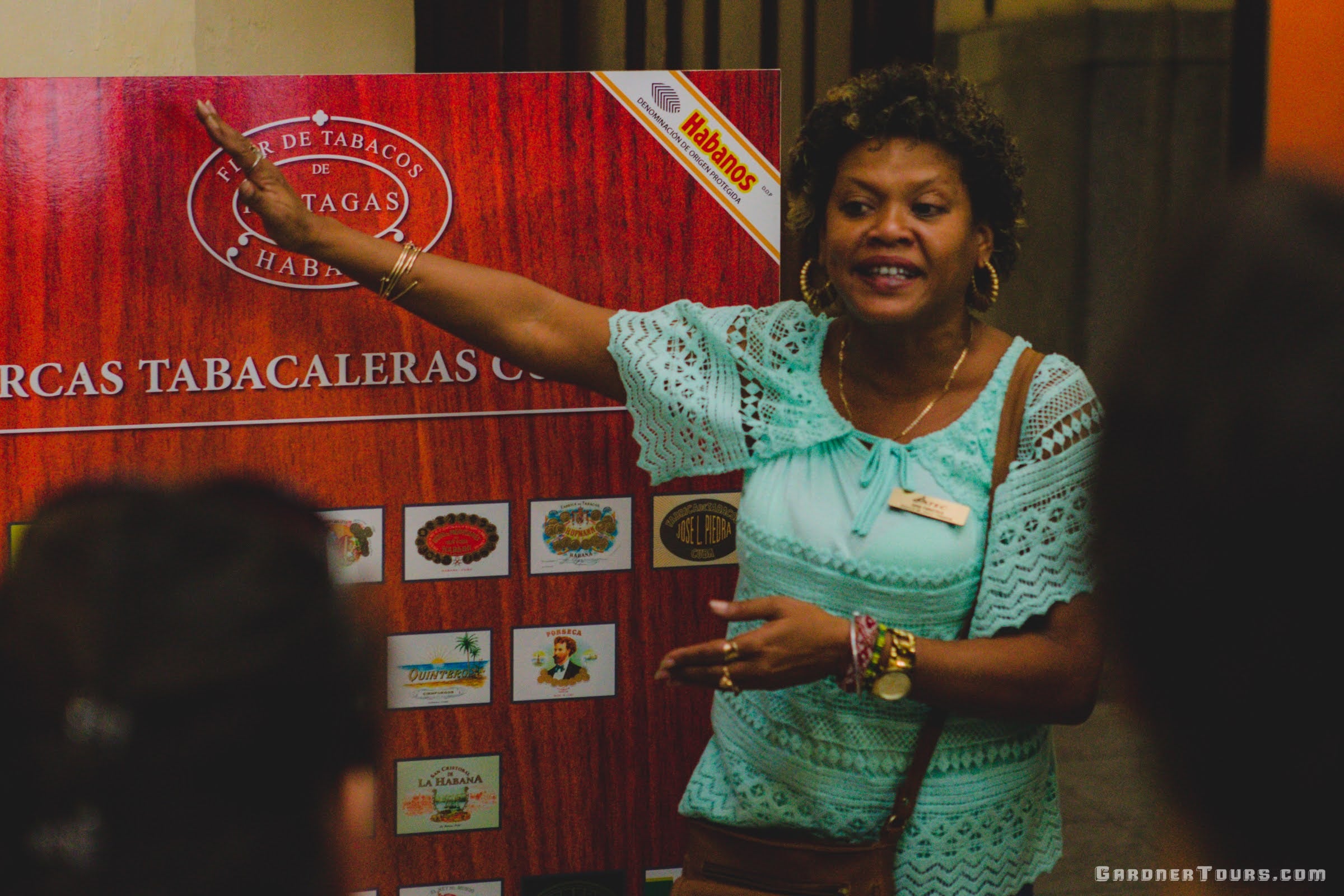 H. Upmann Employee Explaining What Goes On In The H. Upmann Cigar Factory in Havana Cuba