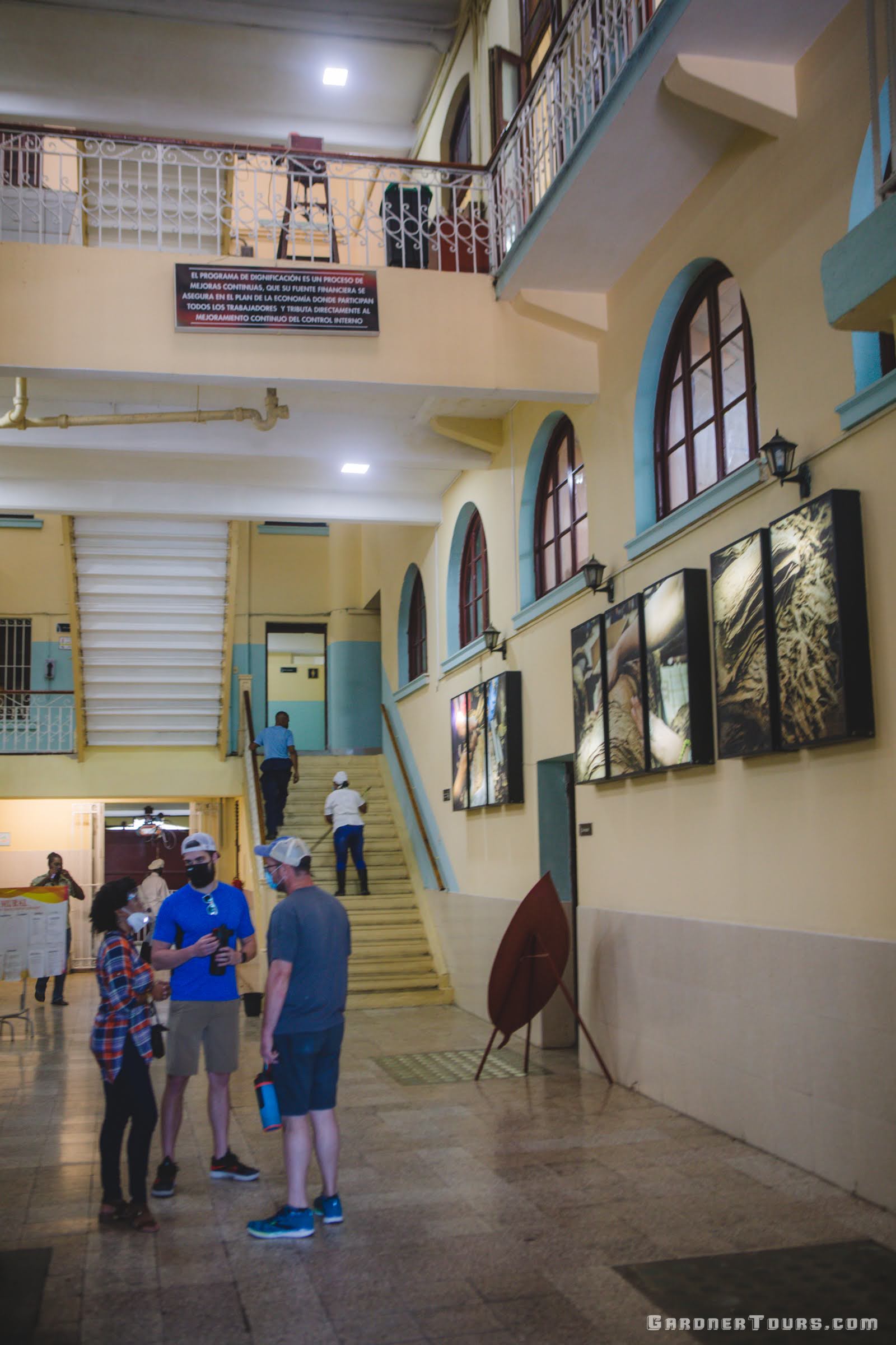 People Talking In H. Upmann Cigar Factory in Havana Cuba