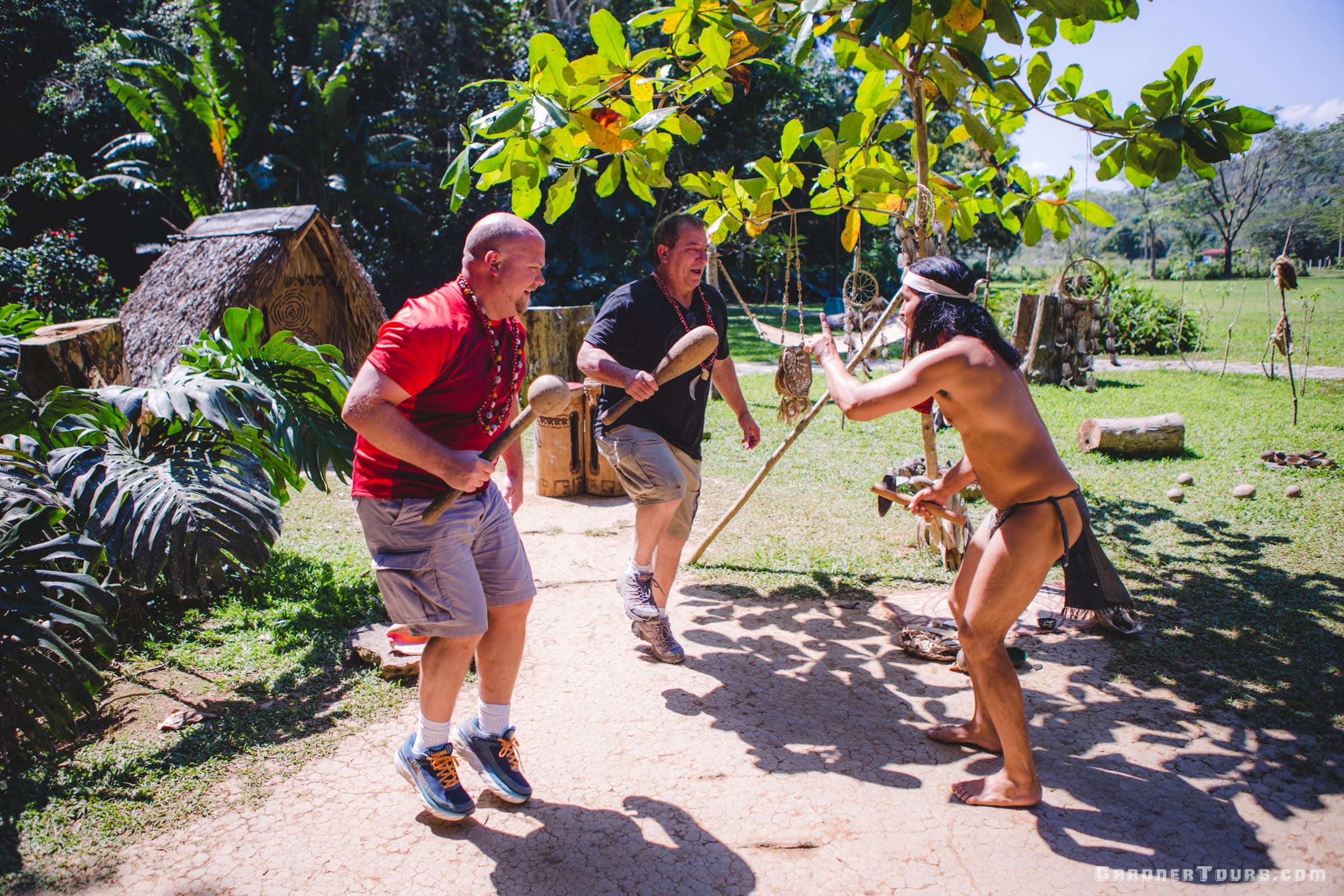 Two men Dancing with Taino Indians in Vinales, Cuba