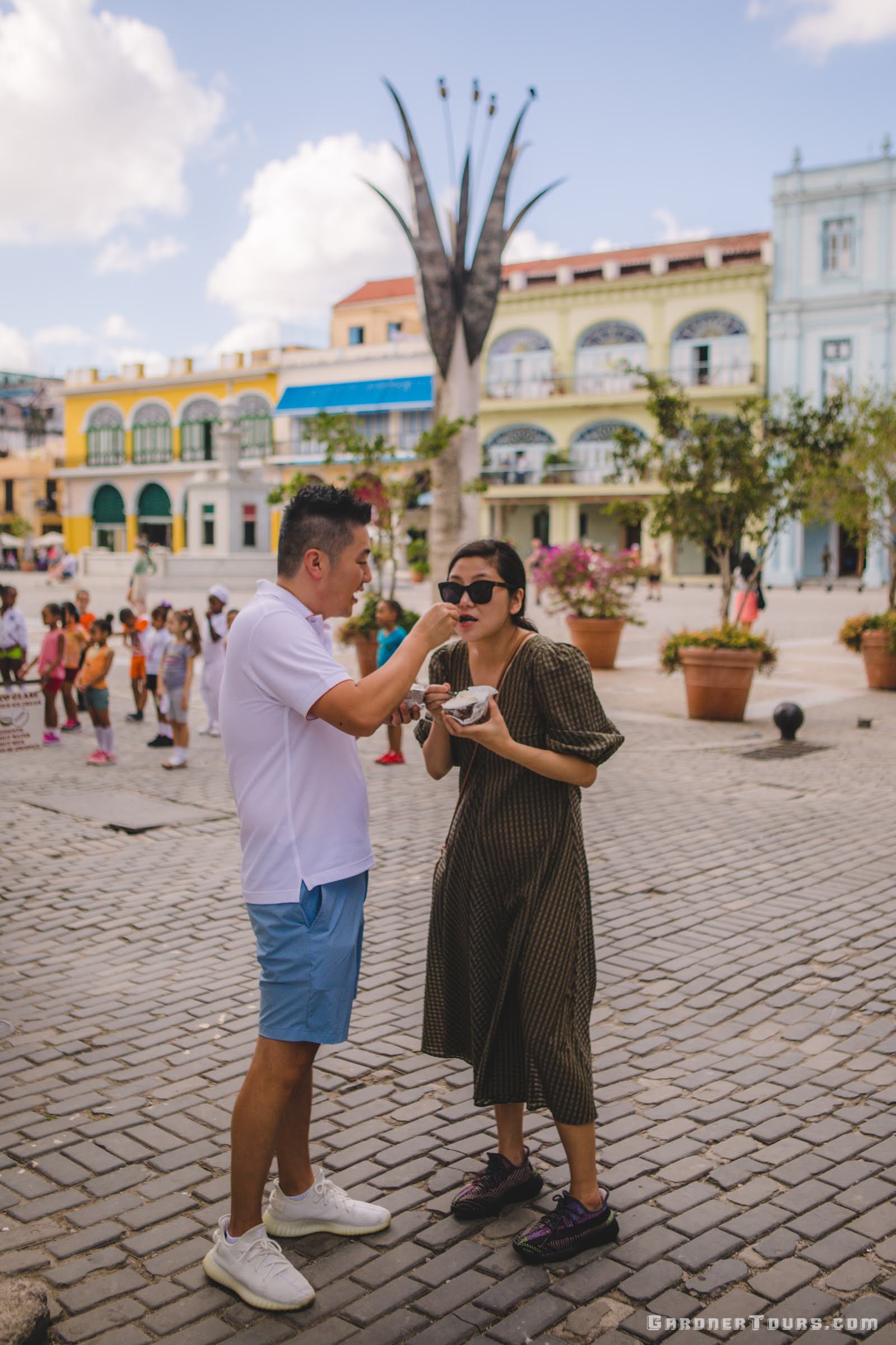 Couple Sharing Ice Cream in Plaza Vieja, Old Havana, Cuba