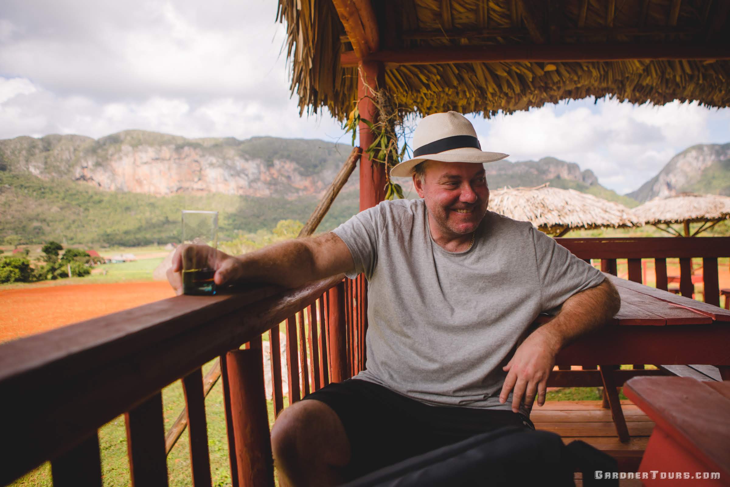 Man Enjoying a Drink at Corazon del Valle in the Vinales Valley, Cuba