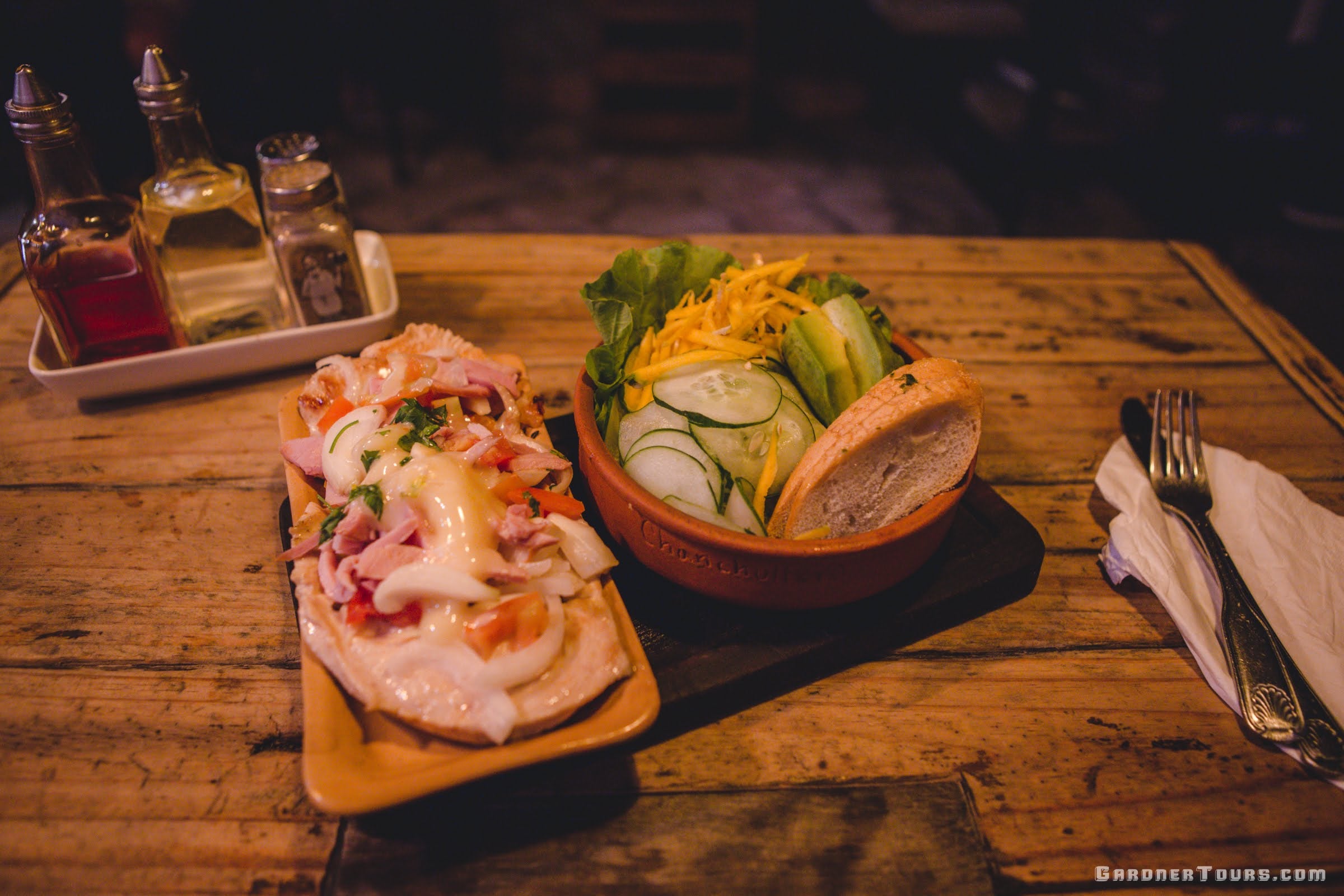 Amazing Dinner Plate with chicken, cheese, onions, bread, and fresh vegetables, and avocado at Restaurant Paladar El Chancullero in Old Havana, Cuba