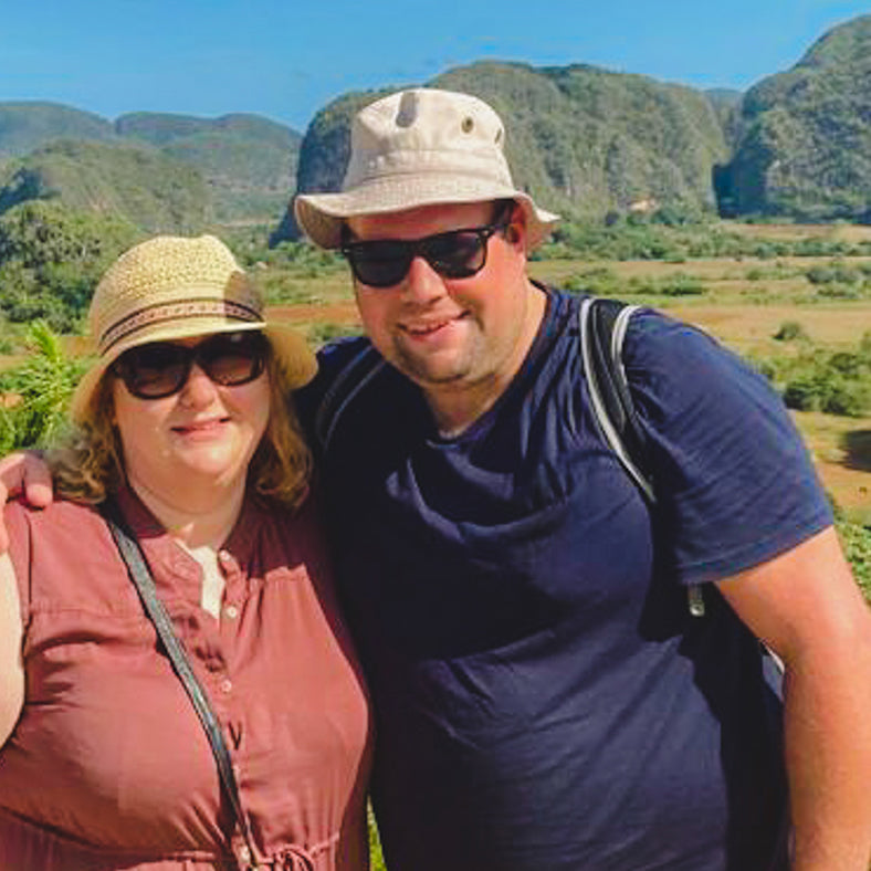 Gardner Tours Cuba Tours Couple Posing at the Viewpoint of Vinales Valley in Cuba