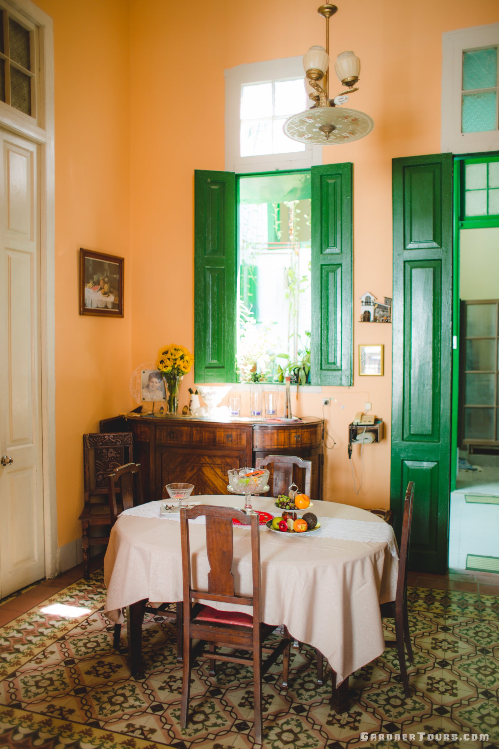 Beautiful Green dining room with classic antiques in Casa Particular BnB in Old Havana, Cuba