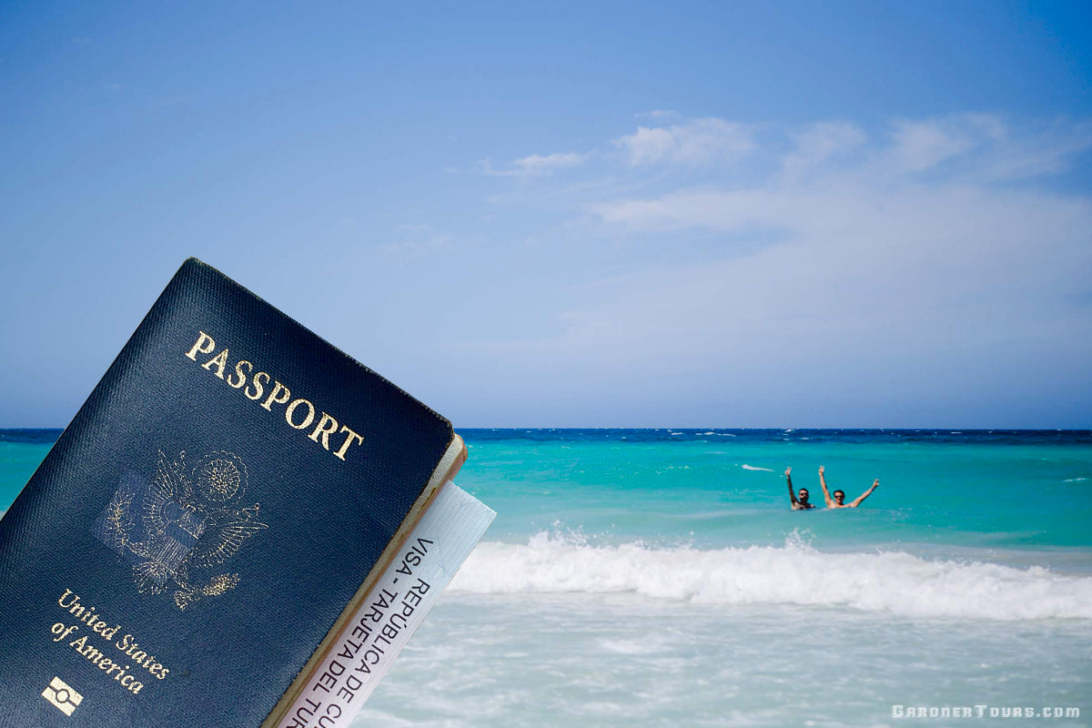 A view of the Playas del Este Beaches outside of Havana, Cuba with a United States Passport holding a tourist Visa in view