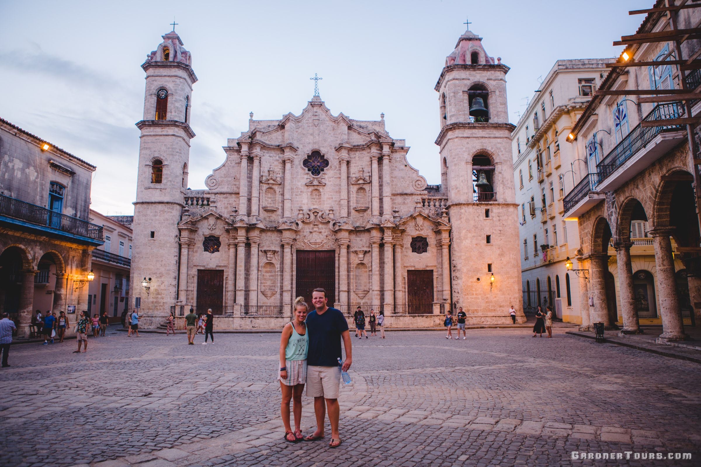 Couple Standing in front of the Havana Cathedral in Havana Cuba at Sunset