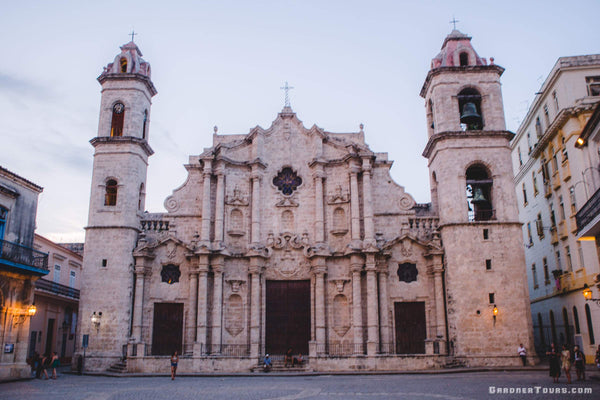 The Cathedral of Havana in Old Havana Cuba just before a purple haze sunset on a beautiful evening