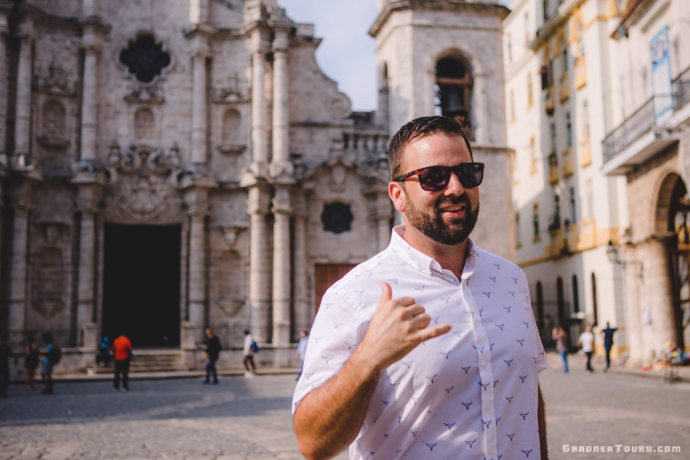 Gardner Tours Owner and Tour Guide Colby Gardner talking about the Cathedral of Havana in Plaza de la Catedral in Old Havana, Cuba