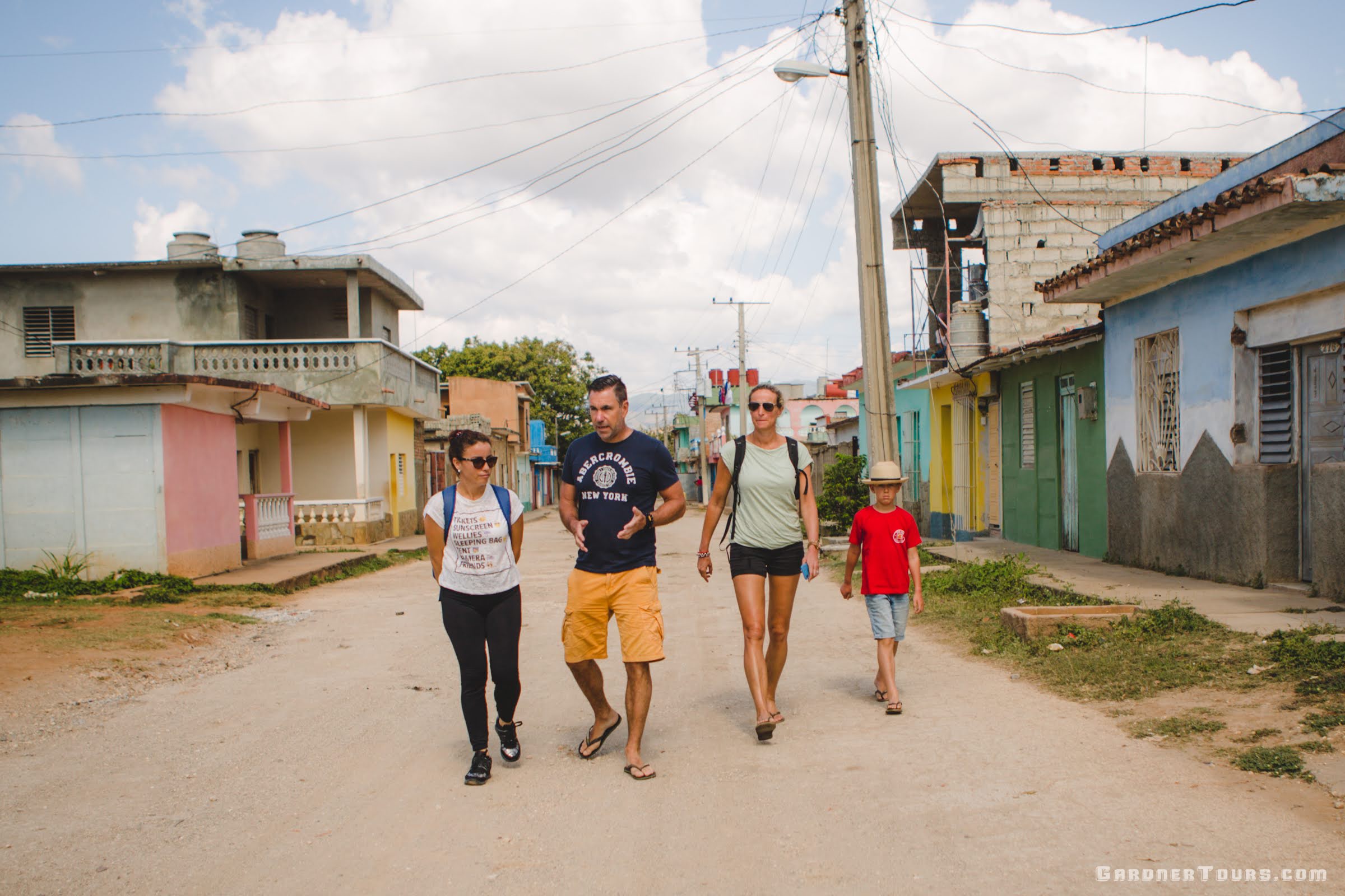 Gardner Tours Cuban Tour Guide Zeydi Walking the Streets of Trinidad Cuba with her travelers from Holland