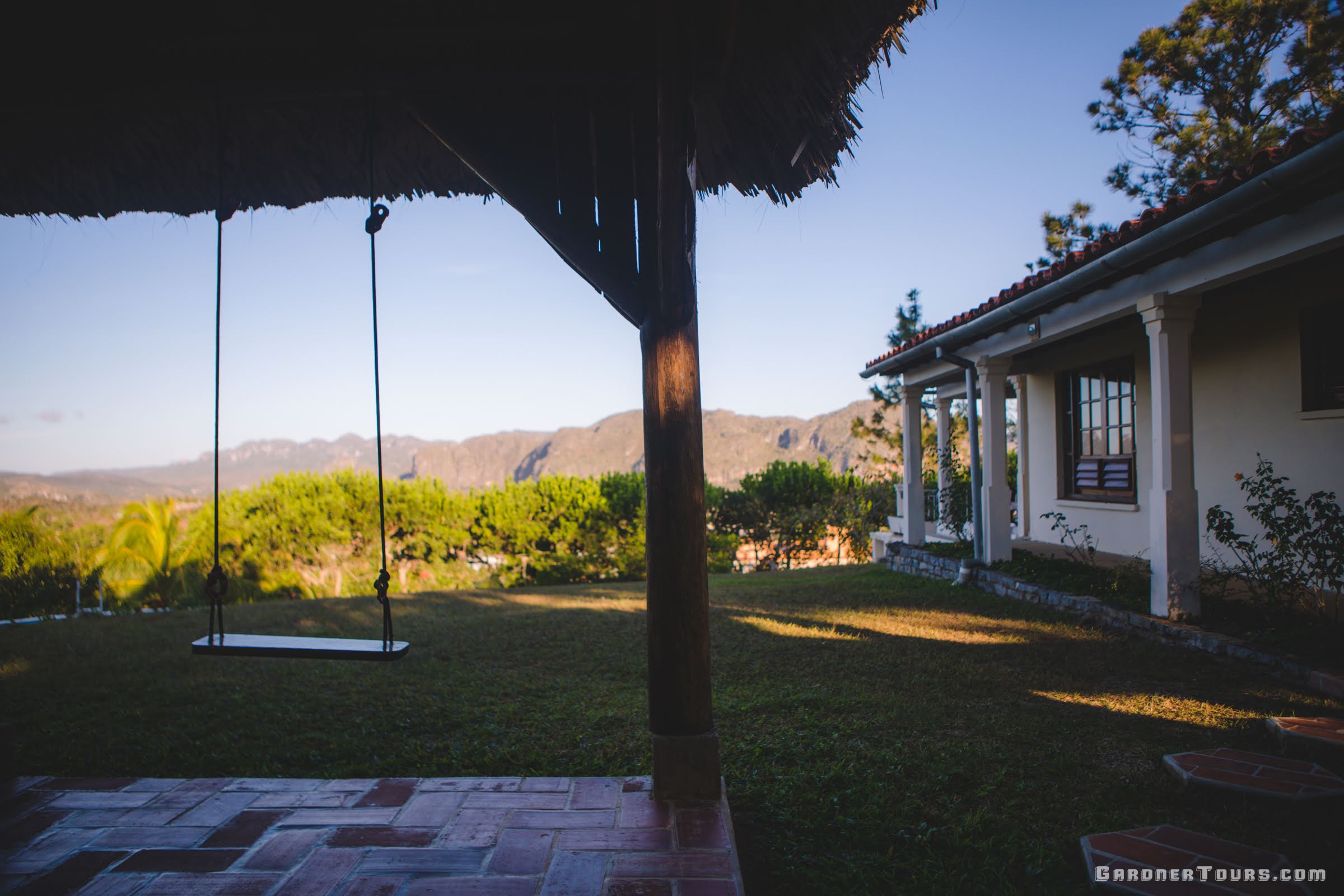A 4-Star Casa Particular BnB with a beautiful View of the swing, house, and the Vinales Valley