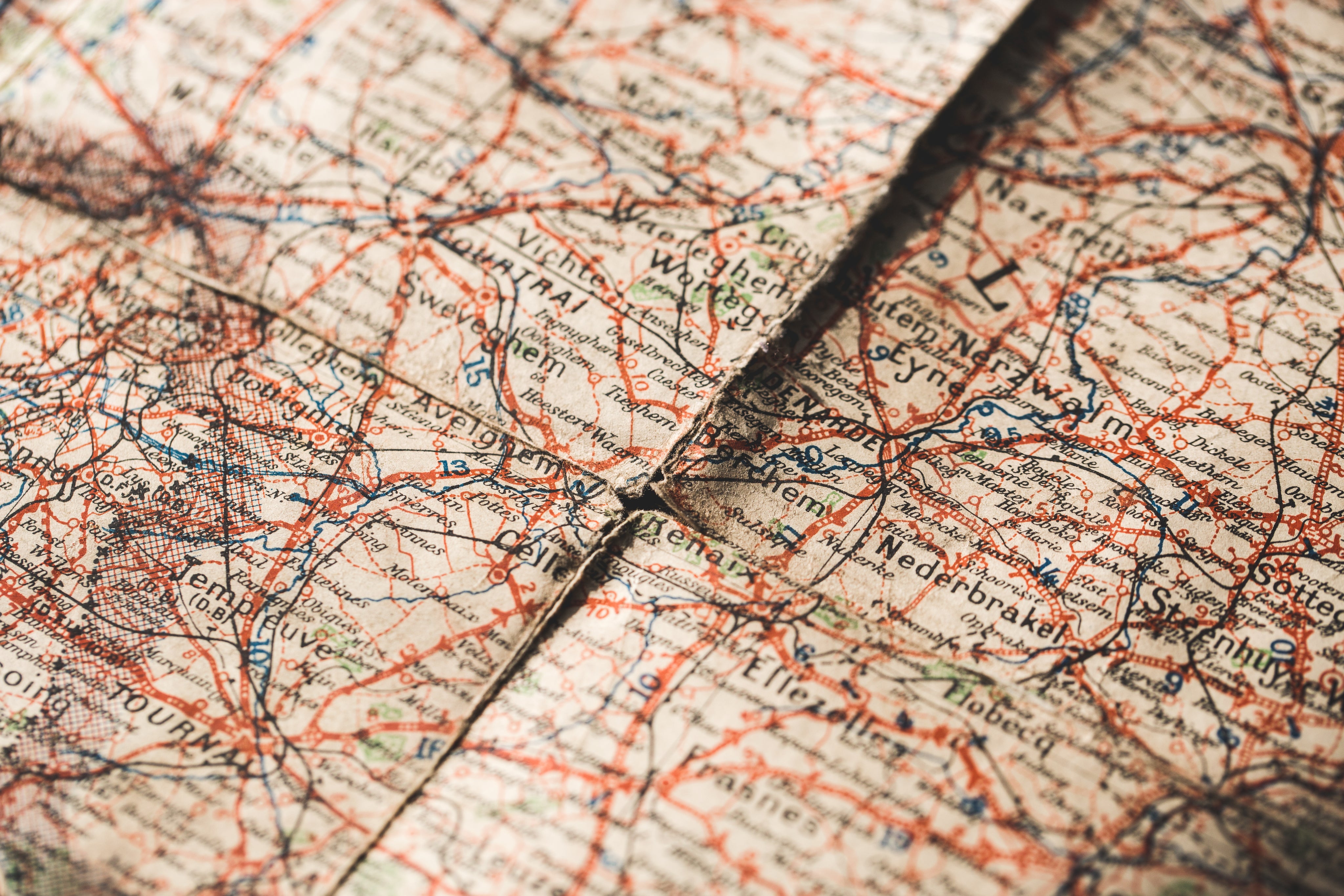 Aged Map with Worn Paper Corners and Broken Seams