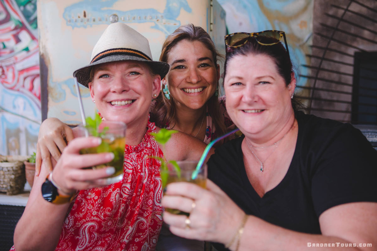 Guests enjoying a private Cuban cocktail class in Old Havana with Gardner Tours—a signature hands-on experience in Cuba.