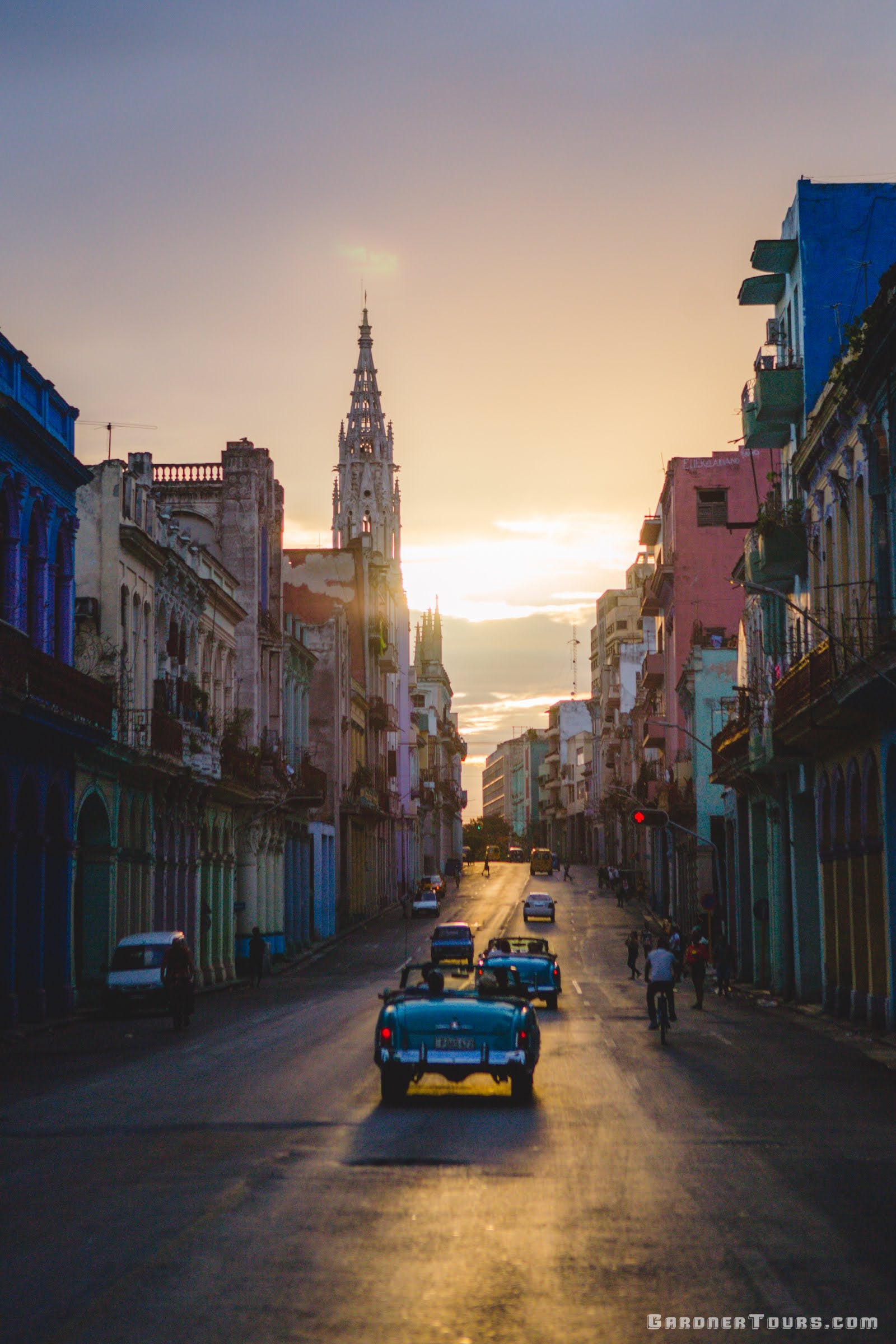 Sunset on a Classic Car Tour down Avenida de la Reina in Havana, Cuba