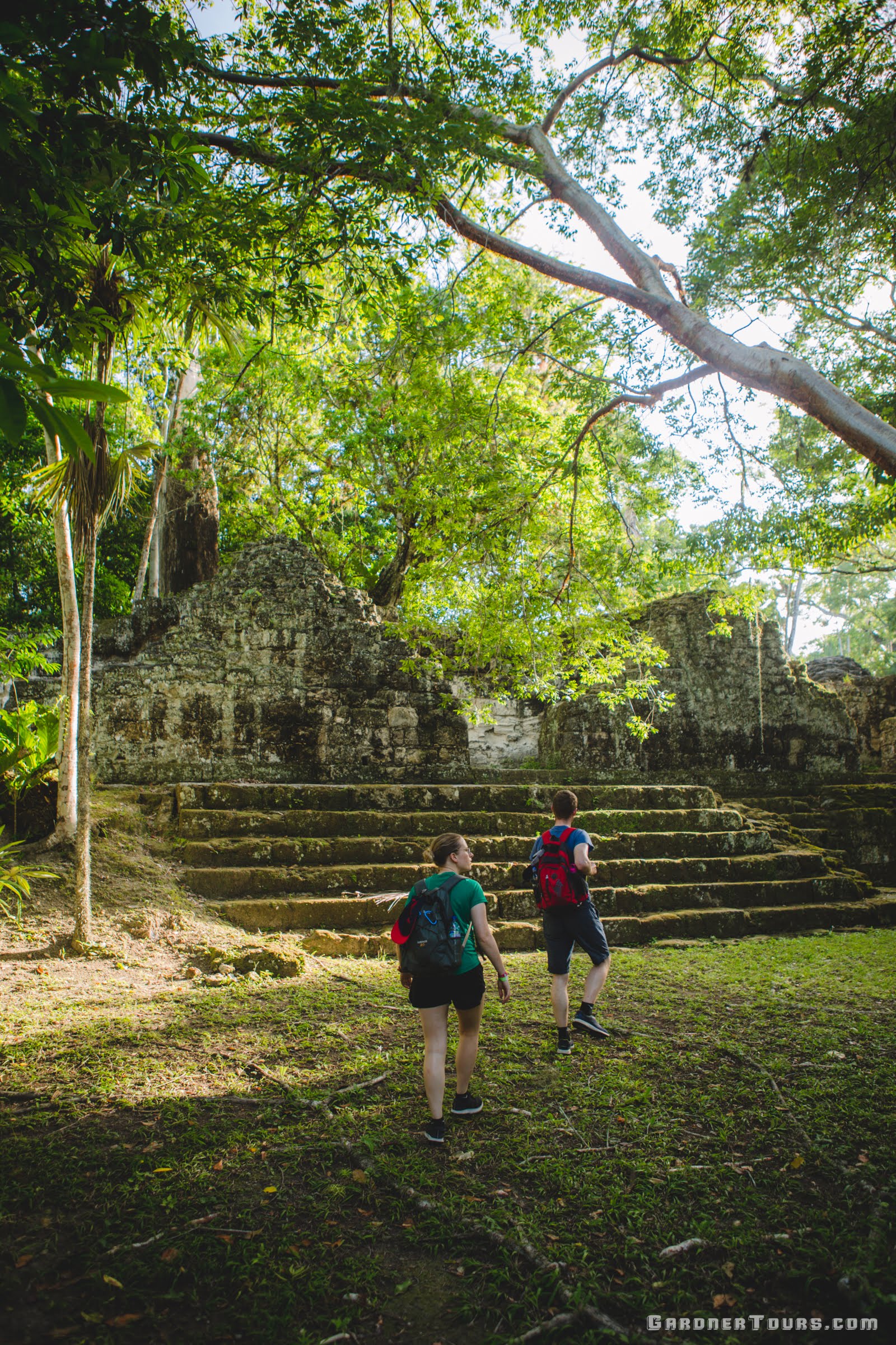 Couple Exploring the green Tikal National Park, Guatemala