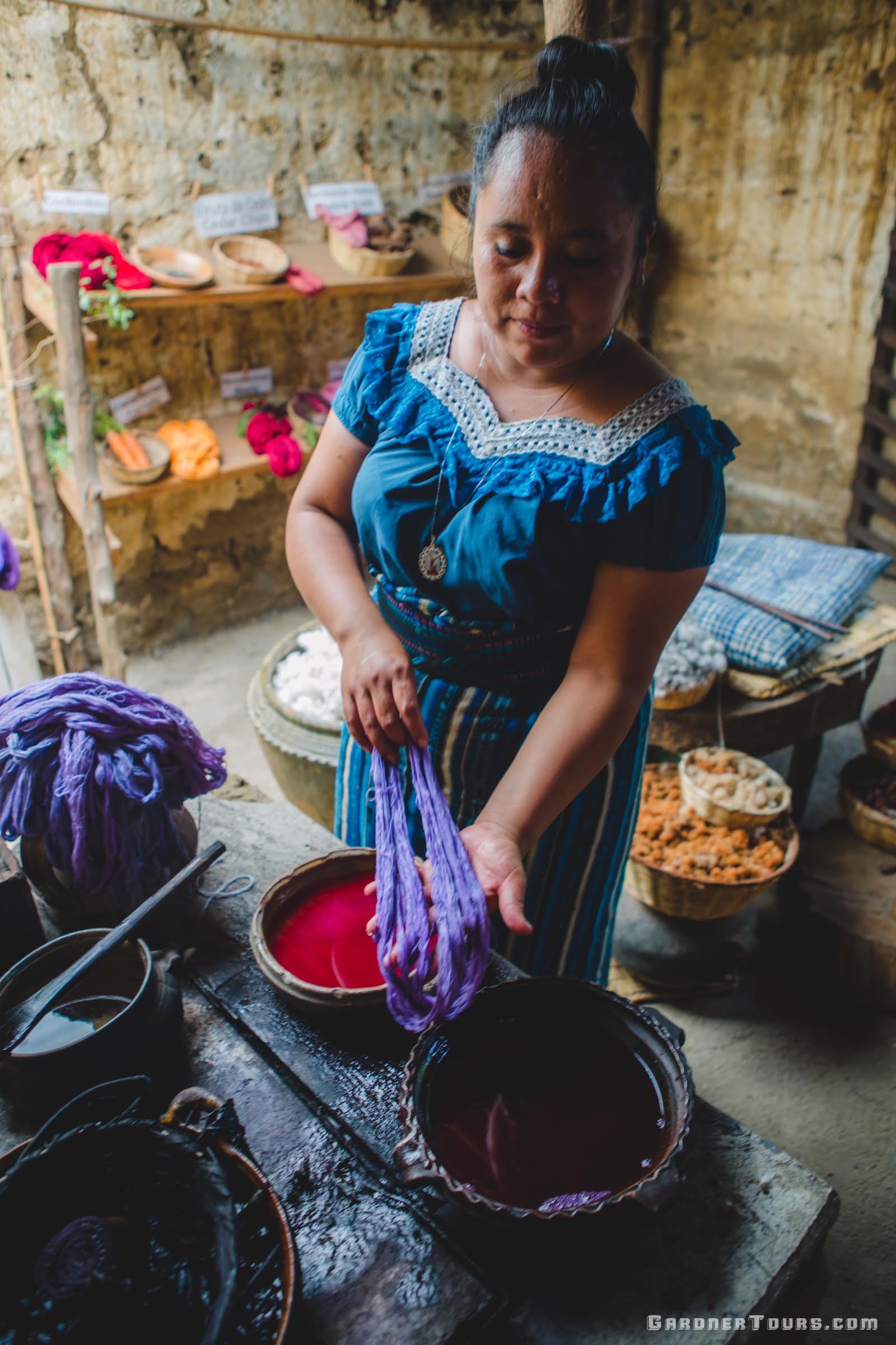 Local Woman Teaching about Ancient Mayan Textiles in San Juan La Laguna, Guatemala